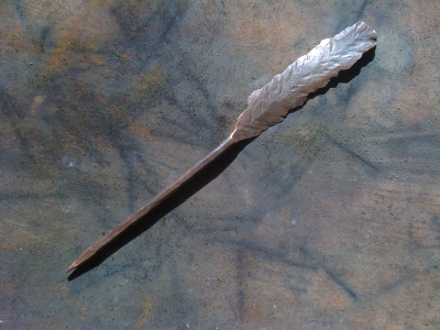 Hand wrought Copper Feather with point quill.
